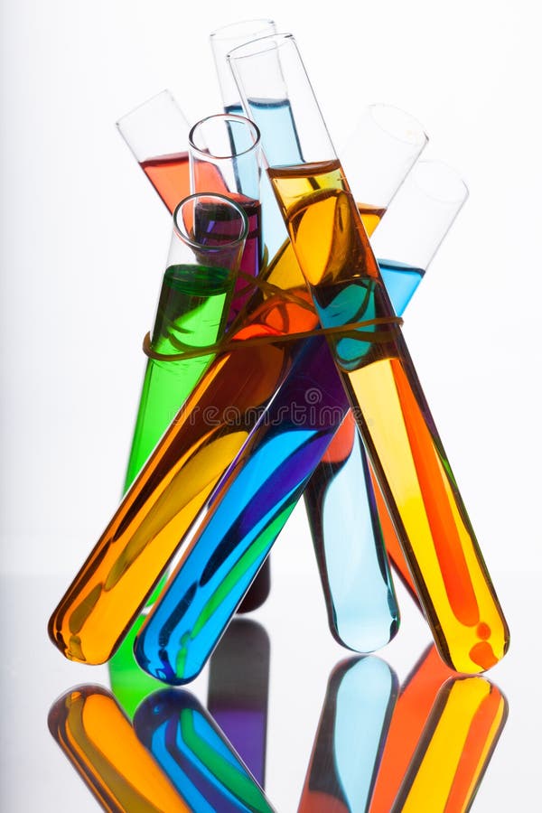 Test Tubes with Colored Liquid in the Spectrum Colors on a White Stock
