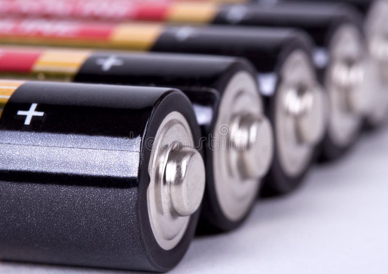 Several AA batteries in perspective closeup view royalty free stock image Several AA batteries in perspective closeup view royalty free stock image