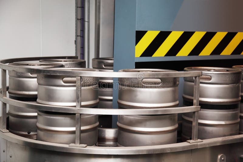 Several Aluminum Beer Barrels Move on Conveyor Stock Photo Image of