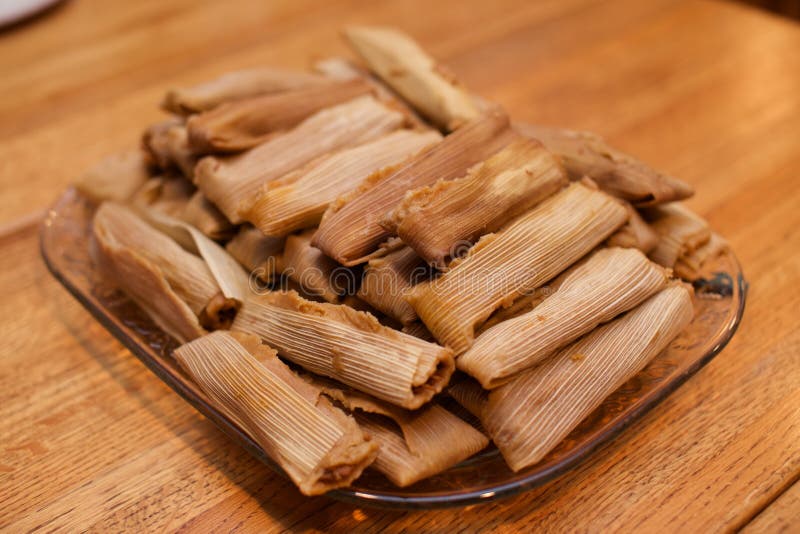 Several Bunch of Fresh Steamed Tamales with Husks