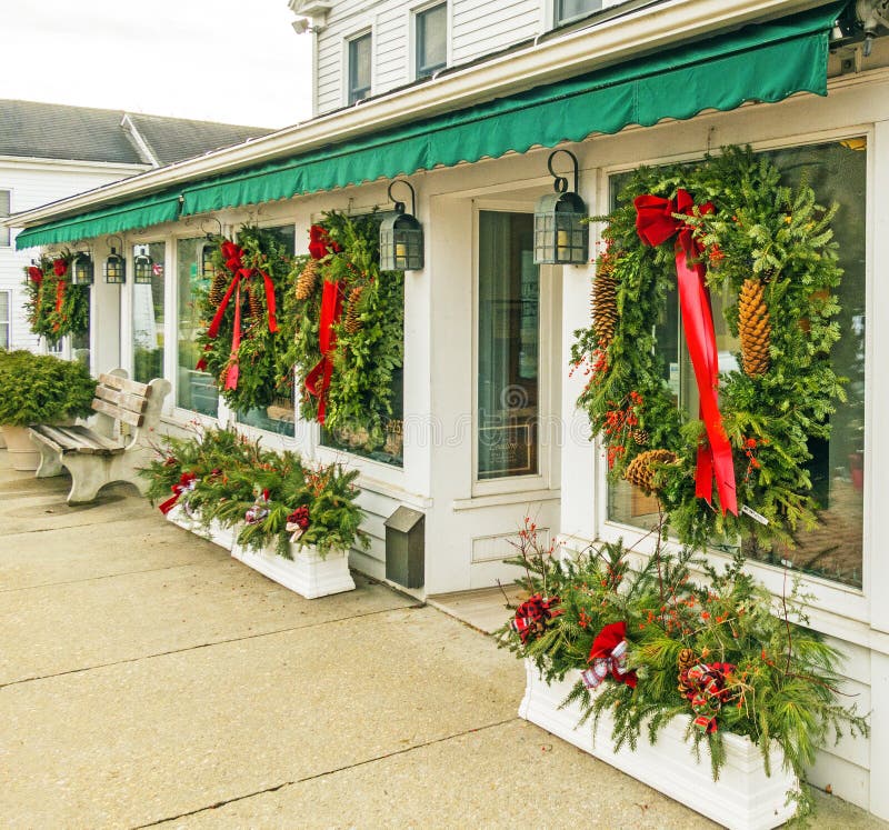 Hanging wreaths and planters decorated for Christmas