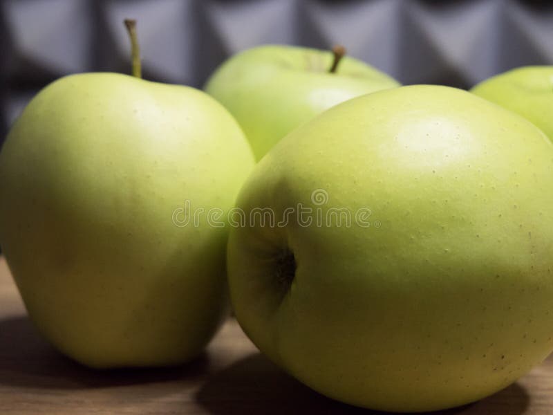 Several green apples, side view. Fruit close-up royalty free stock photos