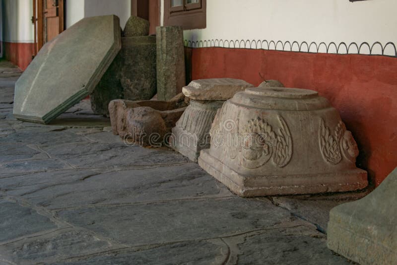 Several large pieces of carved stone, part of the architectural monument stock image Several large pieces of carved stone, part of the architectural monument stock image