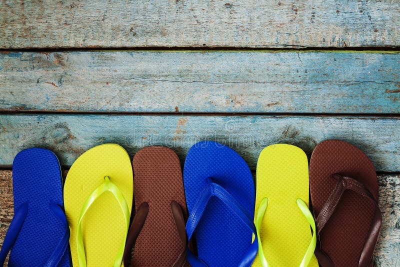 Several Pairs of Multi-colored Rubber Flip-flops Exhibited in a Stock ...