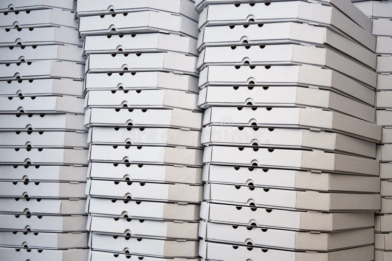 Several rows of pizza boxes, white pizza packing containers royalty free stock image Several rows of pizza boxes, white pizza packing containers royalty free stock image