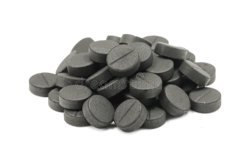 Several Tablets of Activated Carbon Stock Photo Image of carbon, background 73287444