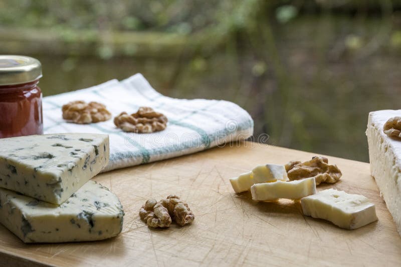 Several tasty pieces of brie and roquefort cheese royalty free stock photos Several tasty pieces of brie and roquefort cheese royalty free stock photos