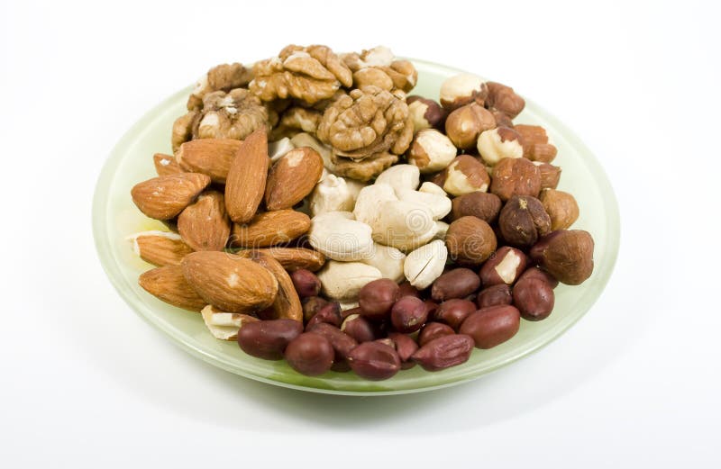 Several types nuts on saucer