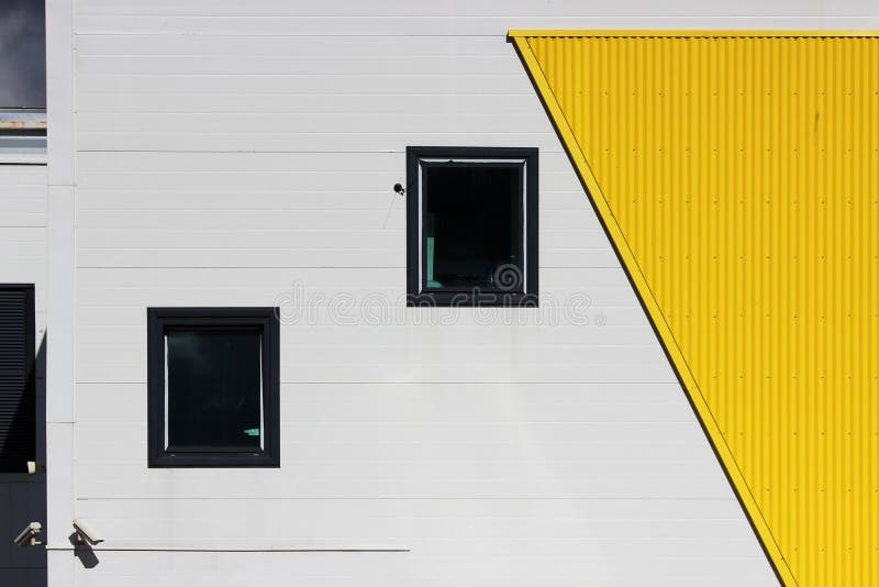 several windows and video cameras in a large shopping center on a beige and yellow background, facade royalty free stock photos several windows and video cameras in a large shopping center on a beige and yellow background, facade royalty free stock photos