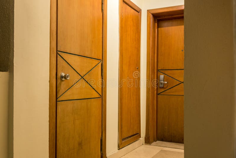 Several Wooden Doors in the Same House Stock Image Image of metal