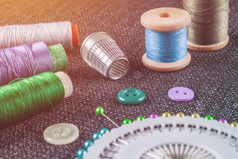 Sewing Accessories: Spools of Threads, Needles, Thimble, Buttons Stock ...