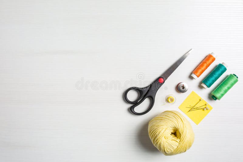 Composition with threads and sewing accessories isolated on white  background. Sewing pattern. Flat lay, top view Stock Photo - Alamy