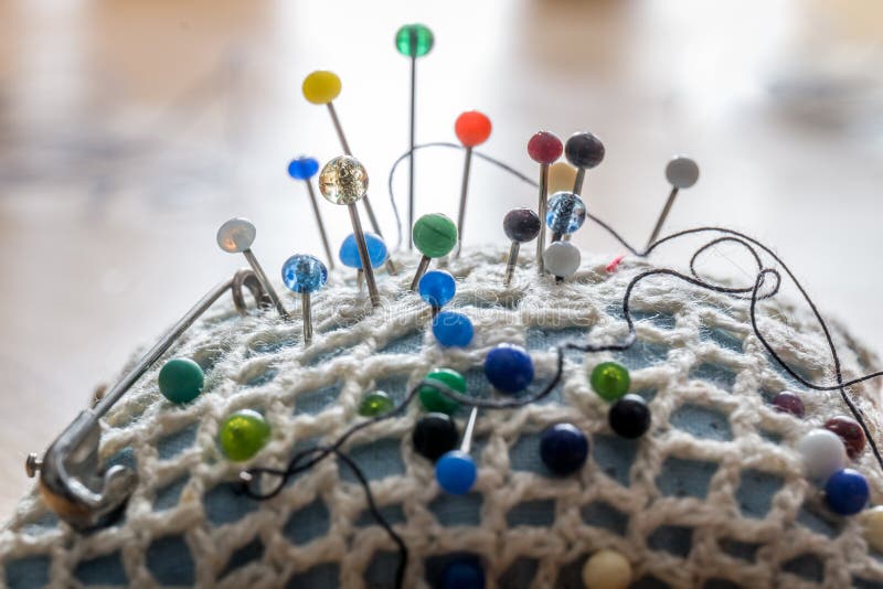 Sewing Push Pins And Pin Cushion Fabric Background Stock Photo Image