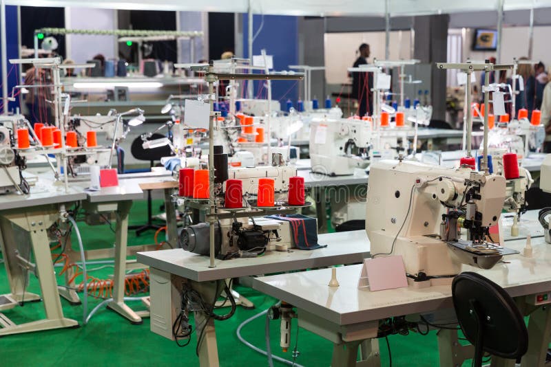 Sewing factory, nobody, overlock machines royalty free stock photo Sewing factory, nobody, overlock machines royalty free stock photo