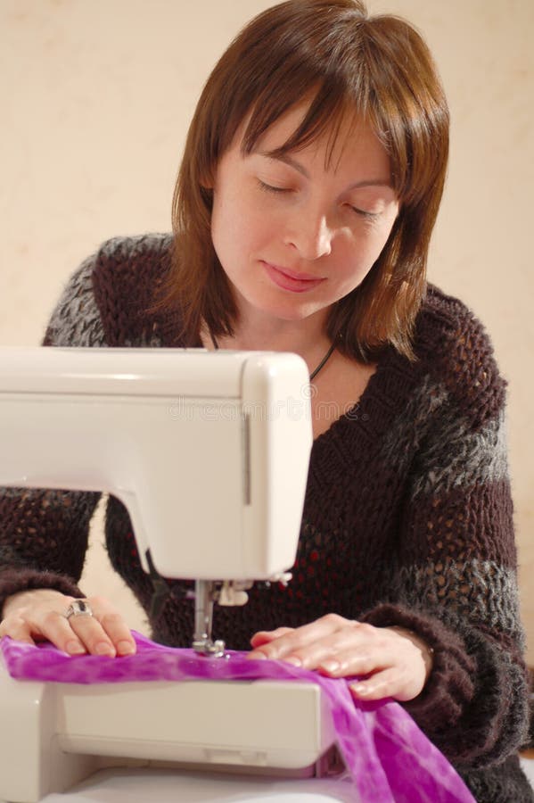 Sewing girl stock photo. Image of person, people, fabric 5608938