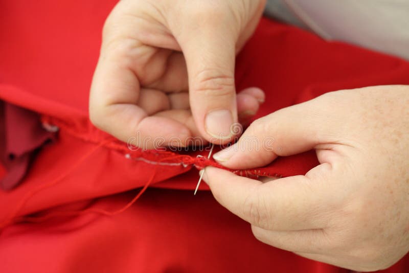 Sewing by Hand , Repair Clothing by Hand Stock Image Image of white, pullover 37730299