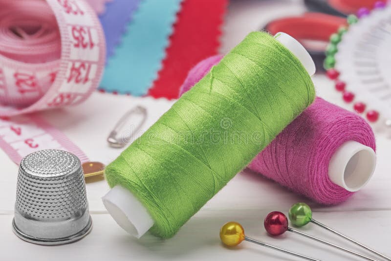 Sewing Kit from Thimble of Colored Thread Buttons of Needles and a