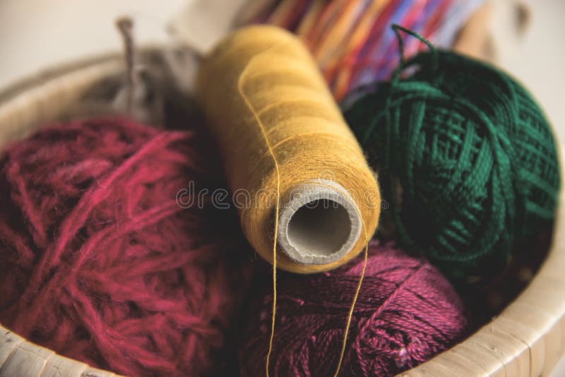 Sewing and Knitting. Knitting on a Wooden Background. Buttons in the