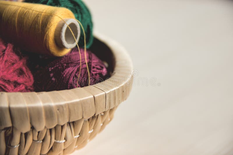 Sewing and Knitting. Knitting on a Wooden Background. Buttons in the