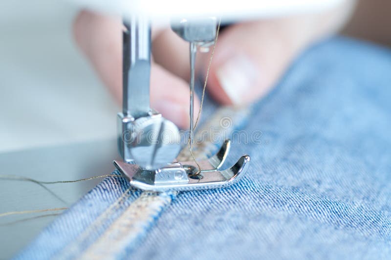 Hands Using a Sewing Machine Stock Image Image of sewing, material