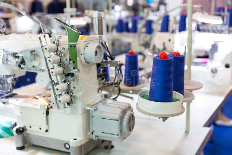 Sewing machine and cloth, nobody, clothing factory stock photo Sewing machine and cloth, nobody, clothing factory stock photo
