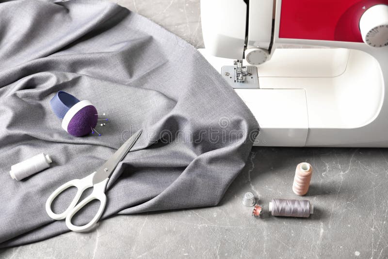 Sewing Machine, Fabric and Accessories for Tailoring on Table Stock