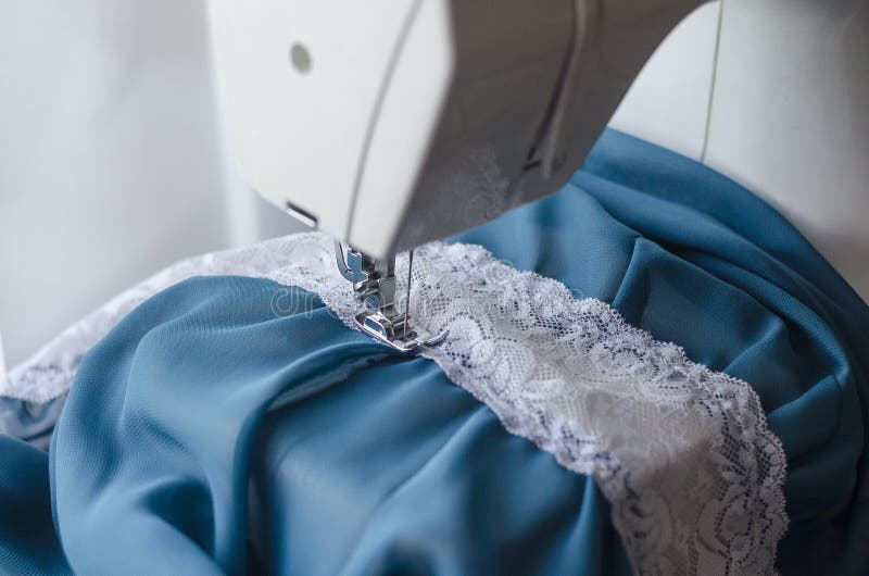 Sewing Machine with Foot, Thread and Needle Sews Lace and Silk. Sewing