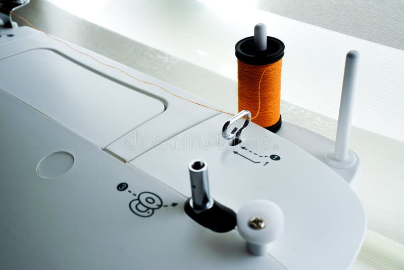 Sewing Machine Needle Bobbin and Stitch Settings Details Close Up View