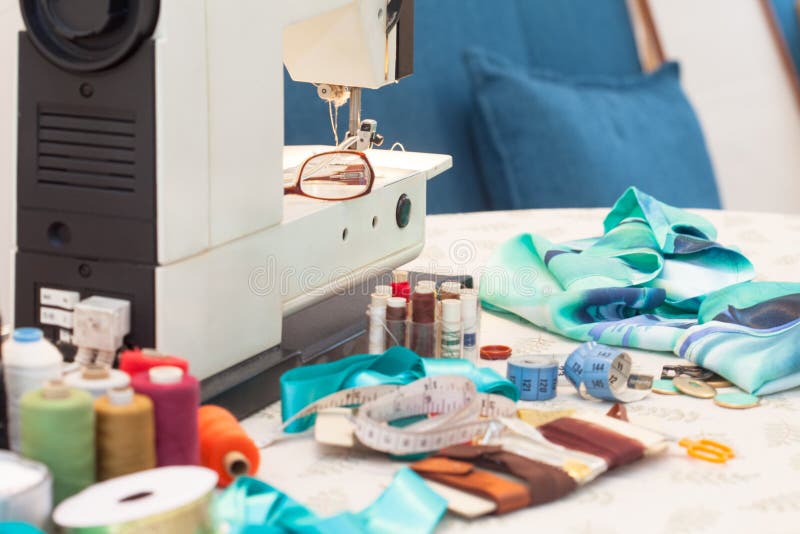 Sewing Machine with Sewing Accessories on Table Stock Image Image of