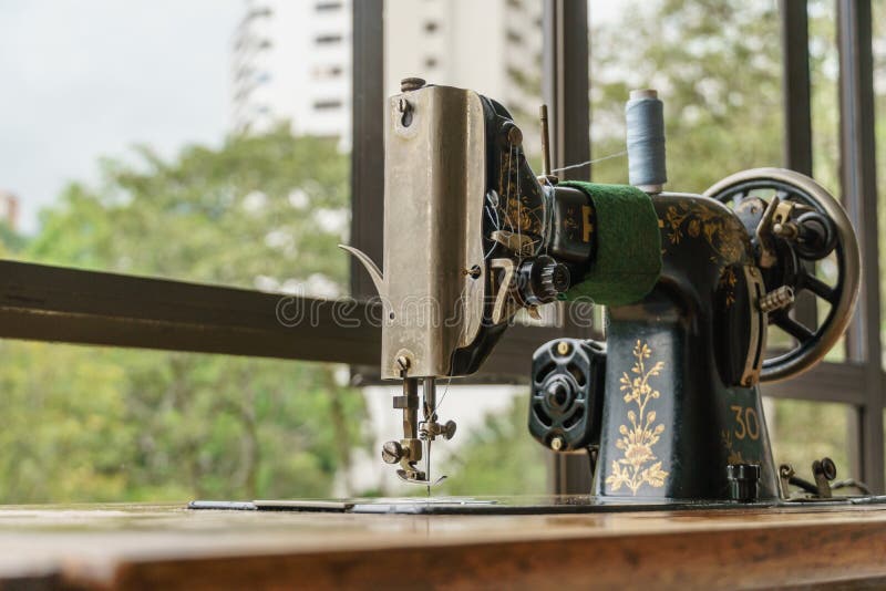 Sewing machine with tread royalty free stock image