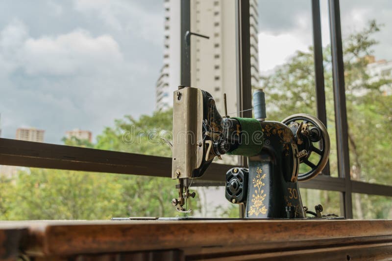 Sewing machine with tread stock image