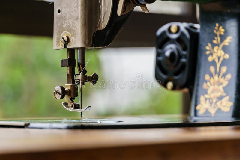 Sewing machine with tread stock images