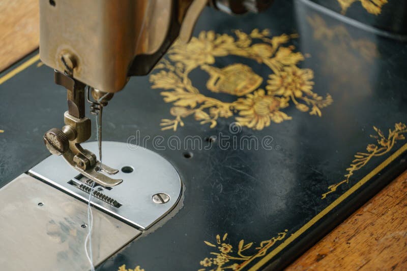 Sewing machine with tread stock images