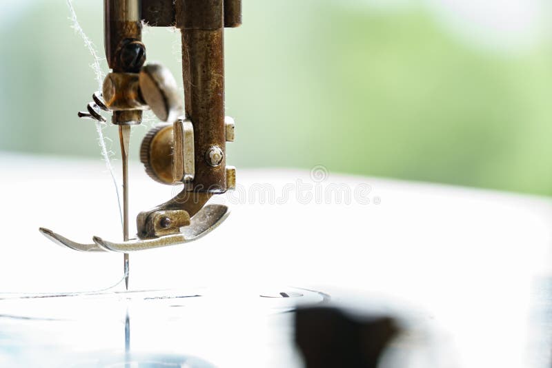 Sewing machine with tread stock photos
