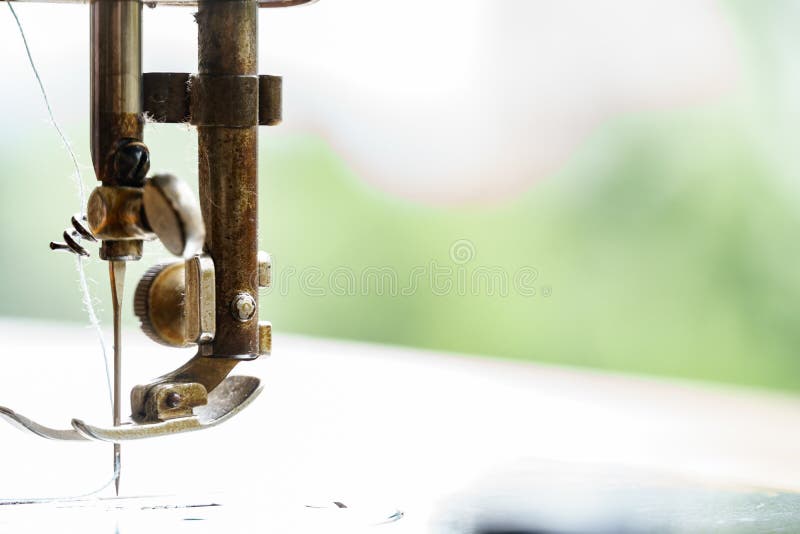 Sewing machine with tread stock photography