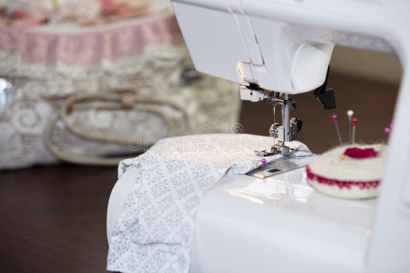 Sewing Machines and Accessories Stock Photo Image of table, material