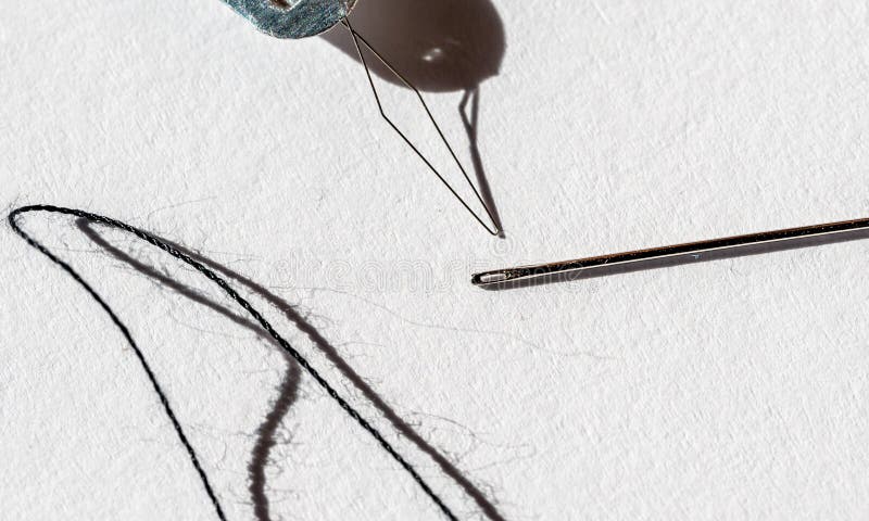 Sewing Needle Threader Tool in Use and a Single Black String. Stock Photo -  Image of seamstress, small: 263395354