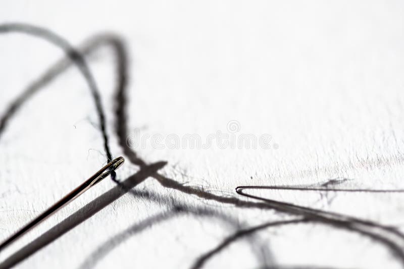 Sewing Needle Threader Tool in Use and a Single Black String. Stock Photo -  Image of seamstress, small: 263395354