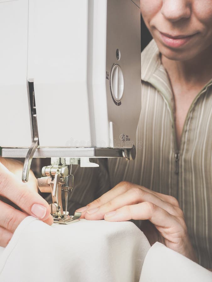 Darning Jeans on a Sewing Machine. Stock Image Image of hand, presser 114574325