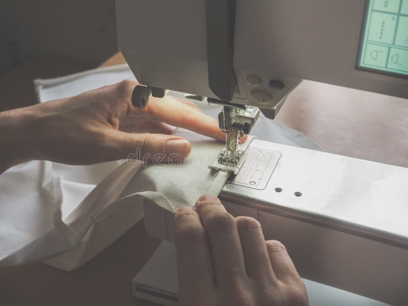 Darning Jeans on a Sewing Machine. Stock Image Image of hand, presser 114574325