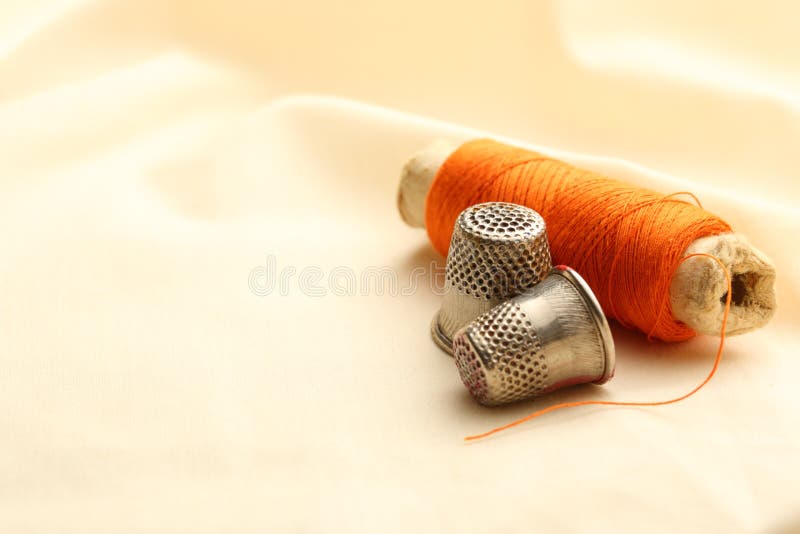 Sewing Thimbles, Bobbin And Needle Stock Photo Image of fold, small