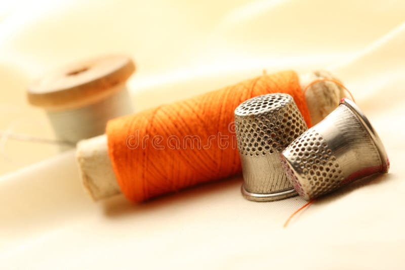 Sewing bobbin and needle stock photo. Image of small 35002450