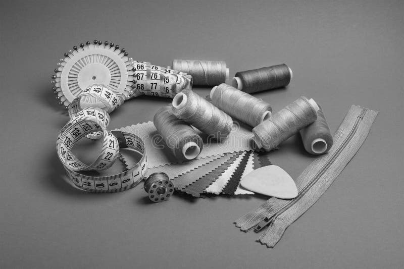 Sewing Threads, Pin, Needle and Thimble in Black and White Style Stock