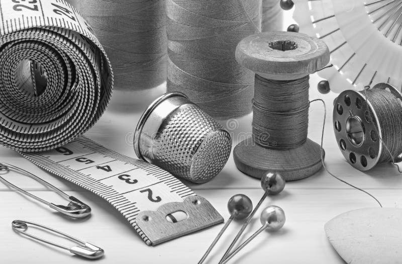 Sewing Threads, Pin, Needle and Thimble in Black and White Style Stock