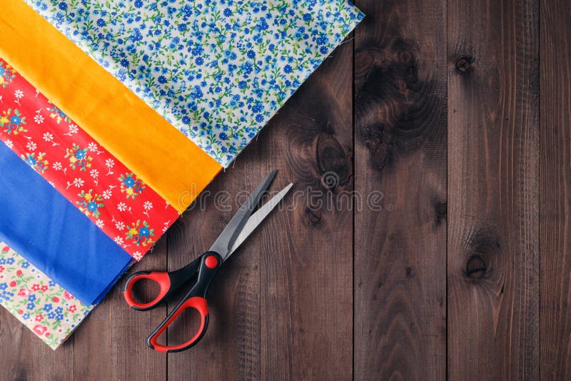Sewing Tools and Sewing Kit on Wooden Textured Background Stock Image