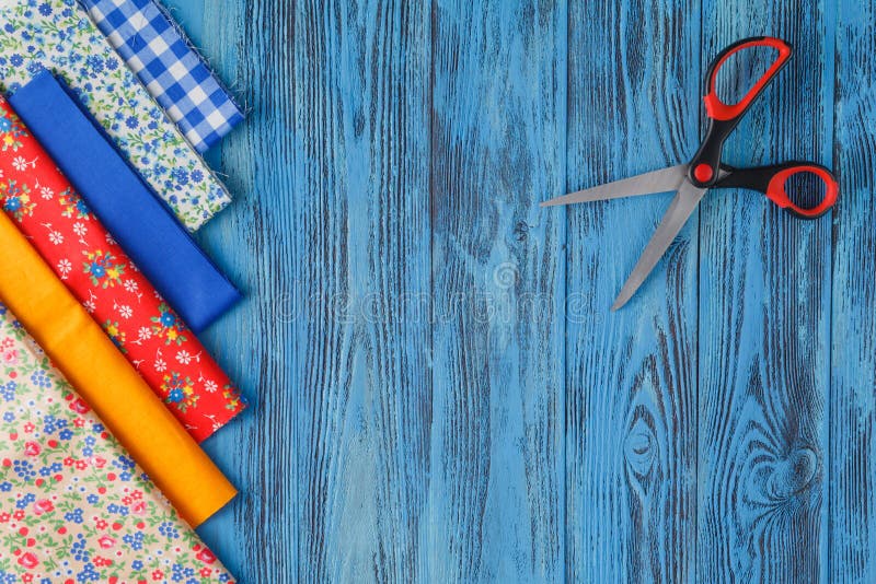 Sewing Tools and Sewing Kit on Wooden Textured Background Stock Image