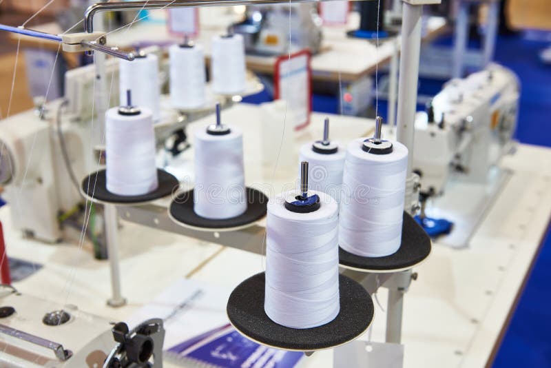 Sewing with Threads and Electric Machines Stock Photo Image