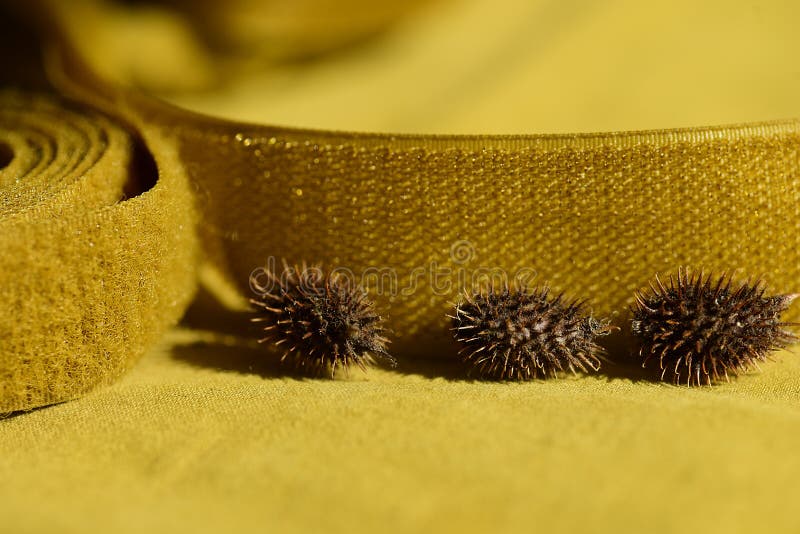 Sewing Yellow Velcro Tape in a Roll Closeup on a Yellow Background