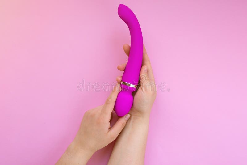 Masturbates with her pink sex tool