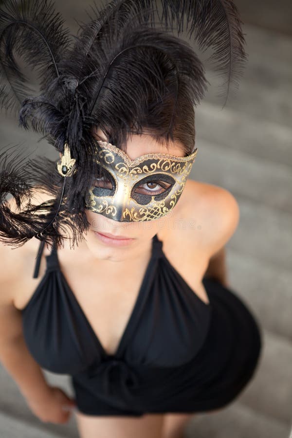 Sexig flicka i den venetian maskeringen royaltyfria bilder Sexig flicka i den venetian maskeringen royaltyfria bilder